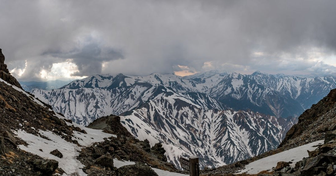 Geological rock layers in high mountain regions where shilajit forms